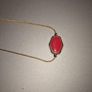Red and gold long necklace